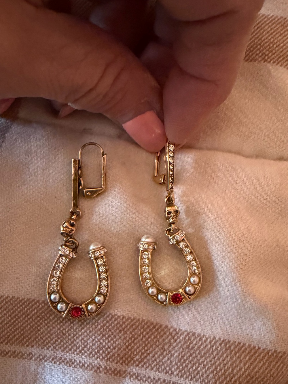 Alexander McQueen Goldtone lucky horse shoe earrings with tiny skulls!